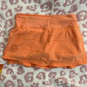 LULU golden apricot pace rival skort